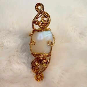 Oval Mother-of-Pearl Ring with Twisted Metal Band
